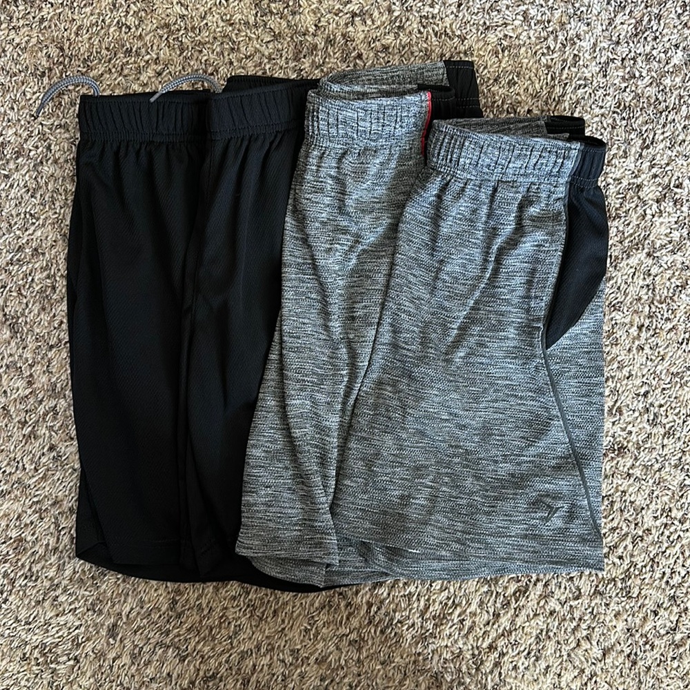 4 pairs of old navy shorts for boys. One pair is NWT the rest are NWOT